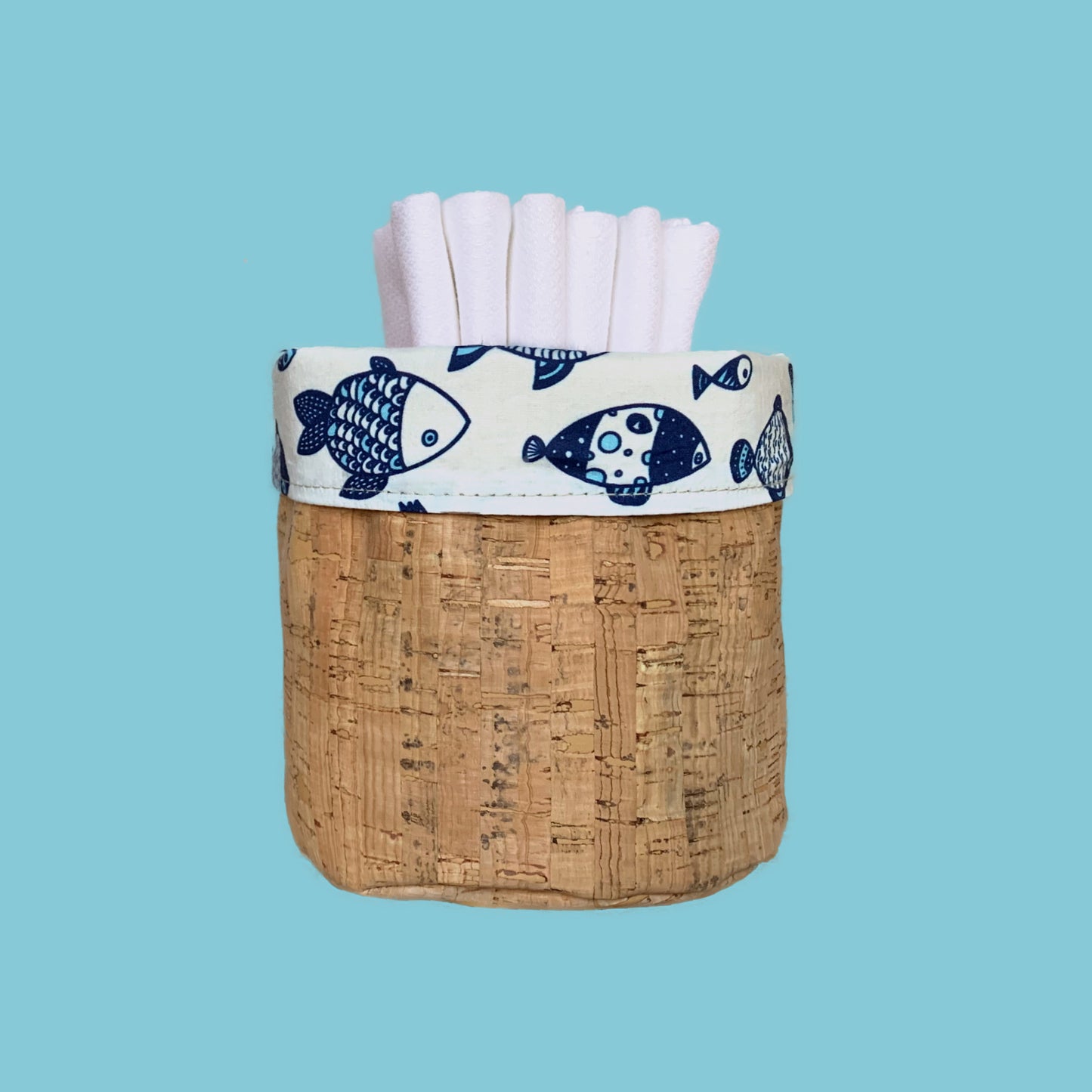 Handecloth Reversible Cork Basket with Nautical Blue and White Fish Fabric that has 6 Reusable Paper Towels Inside