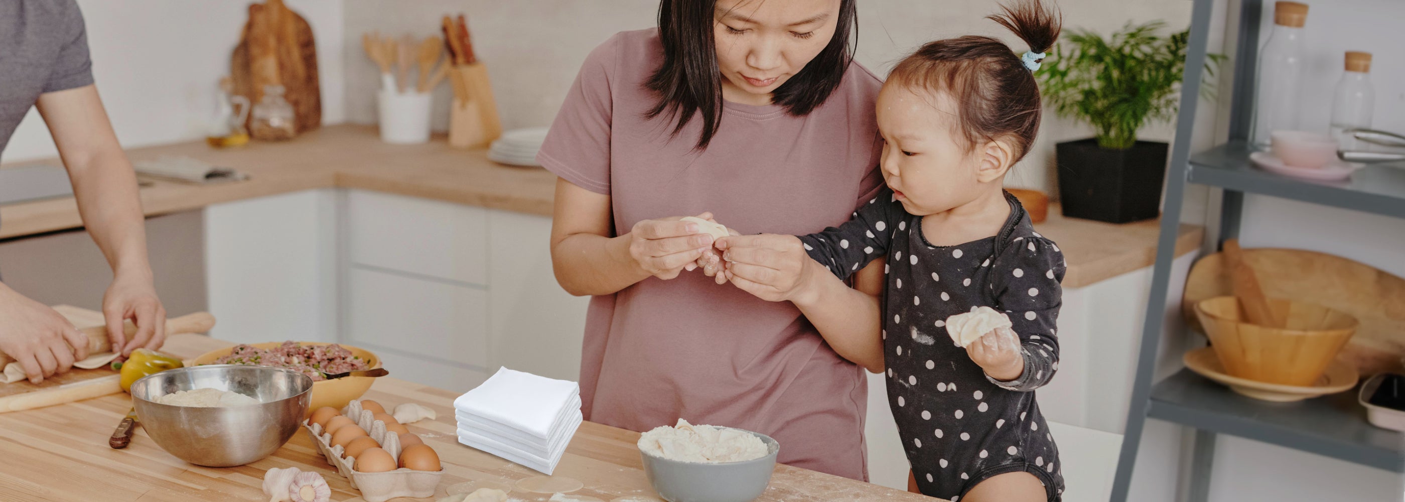 Handecloth Reusable Paper Towels on Counter while family cooking - Photo by Shotpot and Pexels