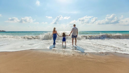 Family walking on the beach