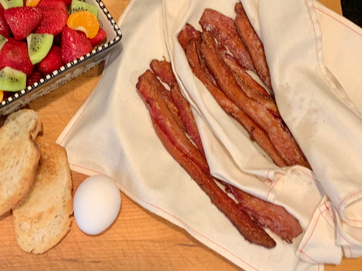 Bacon on the Handecloth Reusable Grease Absorbing Cloths with Bacon. They are absrobing excess grease like a sponge