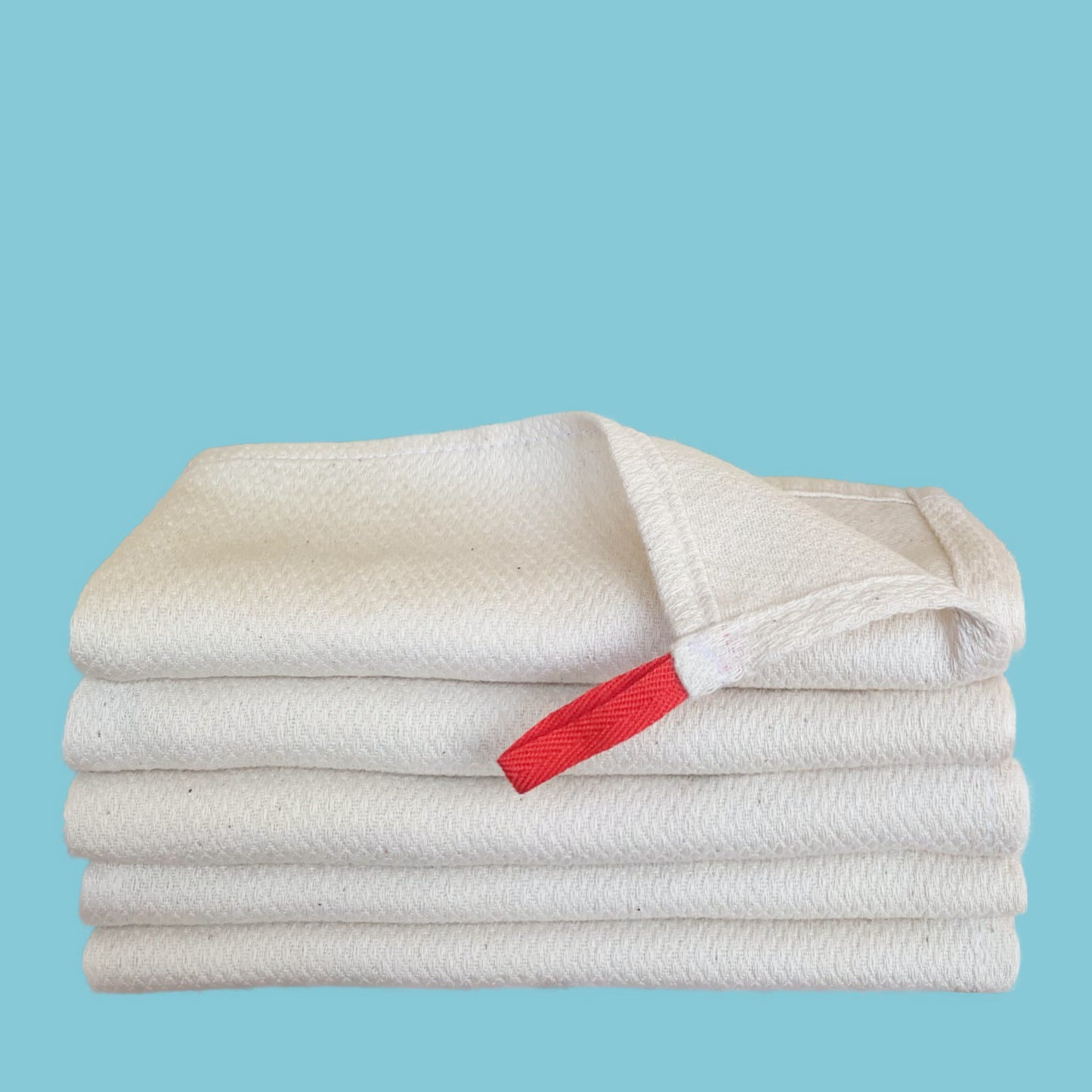 Pile of five reusable Grease Absorbing Organic Cloths from Handecloth